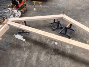 Layout and fitting of Accoya Portal frame truss glulam